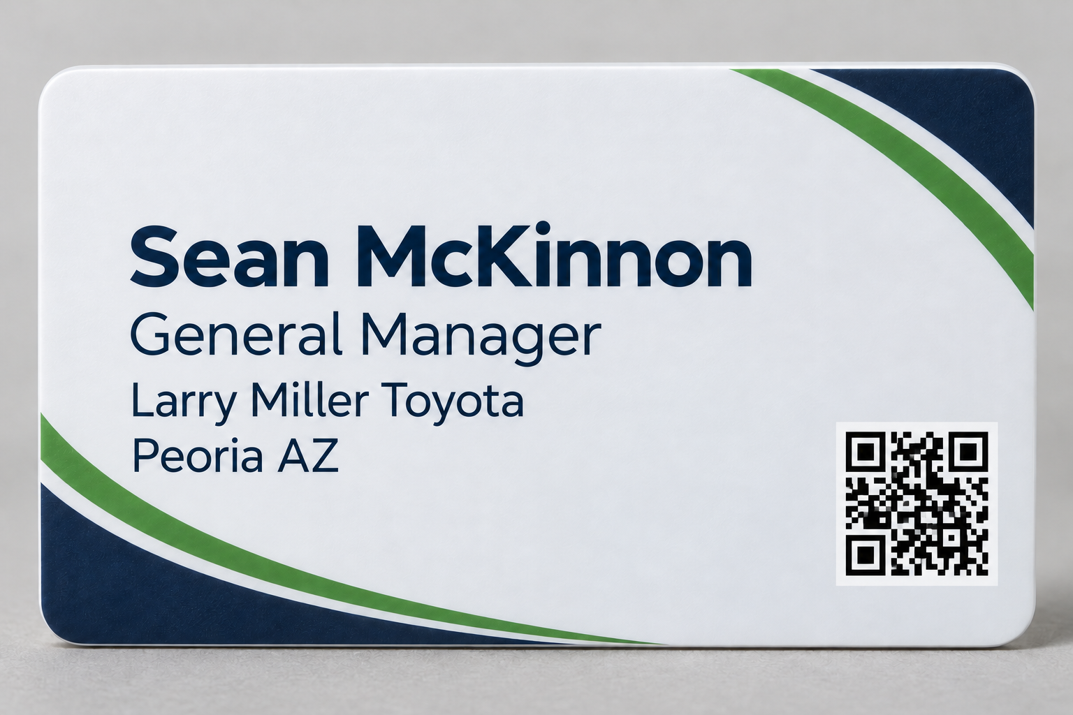 Back of sample NFC card: Sean McKinnon, General Manager, Larry Miller Toyota, Peoria AZ, with an illustrative QR graphic